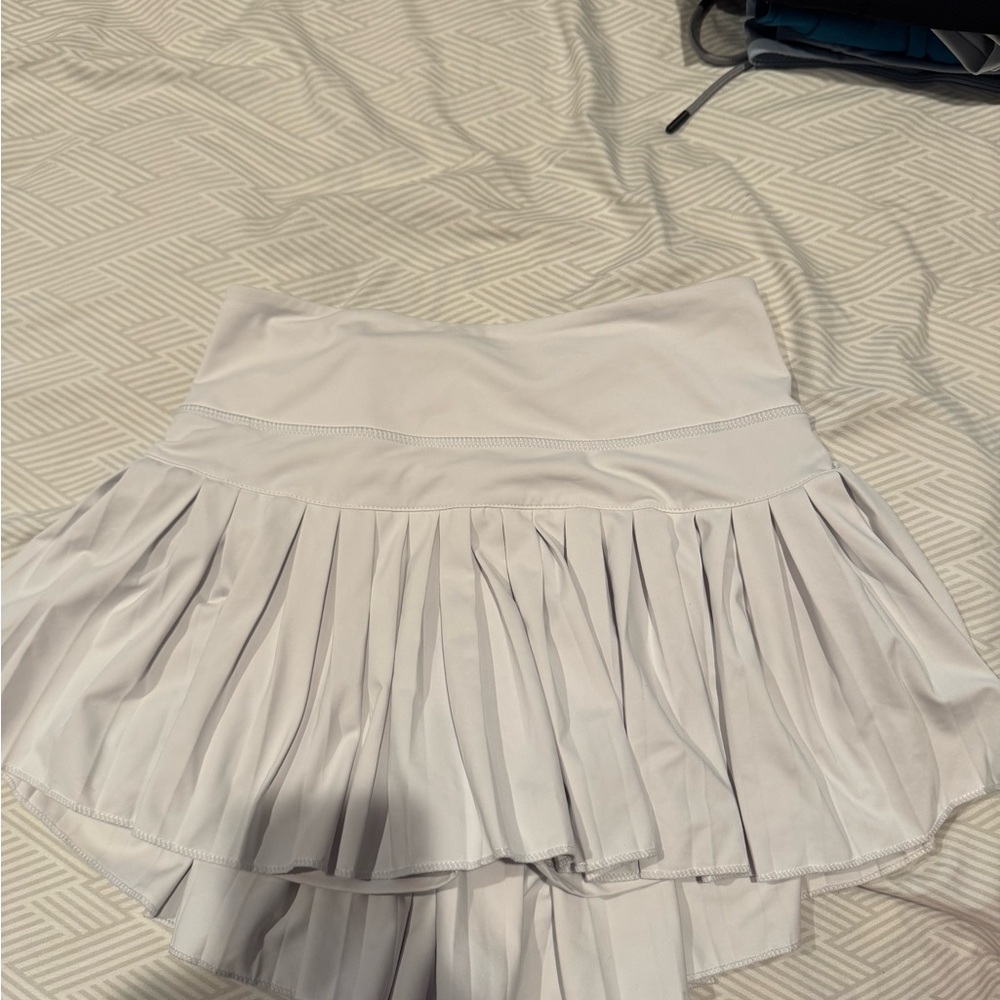 Gold Hinge pleated skirt